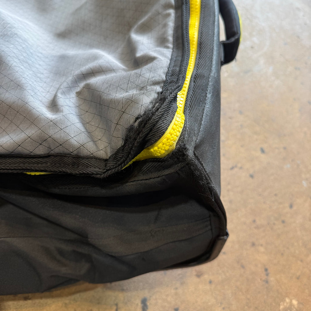 Used Dakine World Traveler Quad Roller Bag