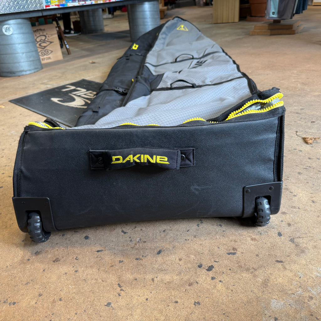 Used Dakine World Traveler Quad Roller Bag