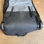 Used Dakine World Traveler Quad Roller Bag