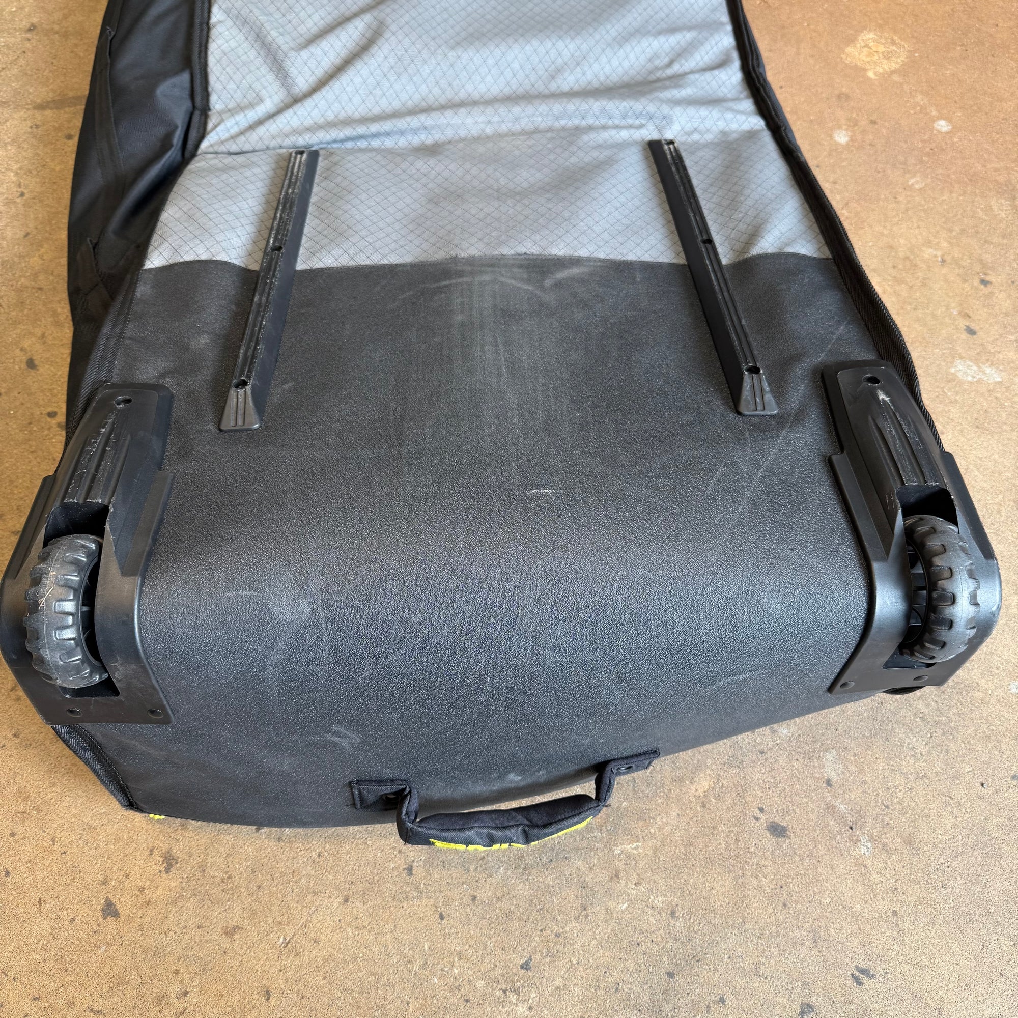 Used Dakine World Traveler Quad Roller Bag