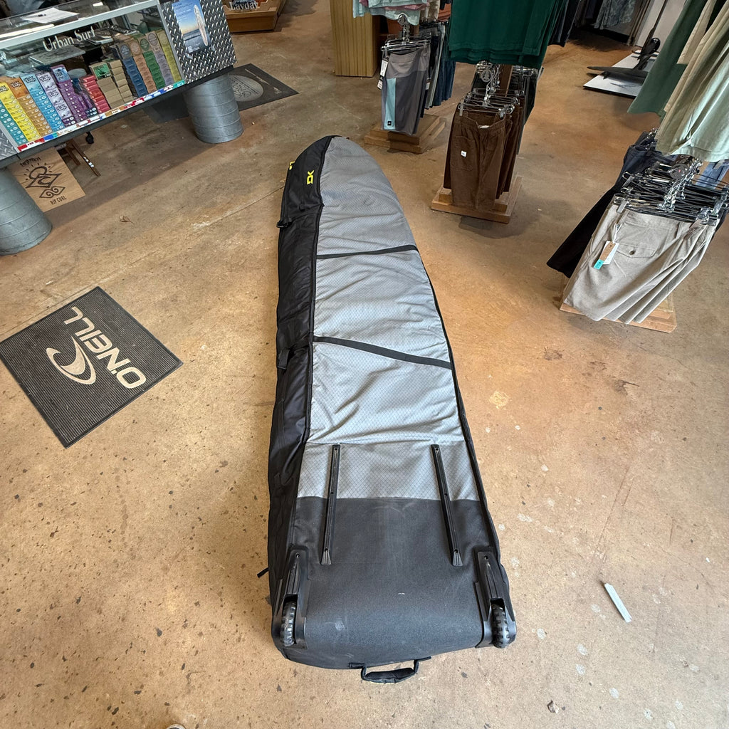 Used Dakine World Traveler Quad Roller Bag